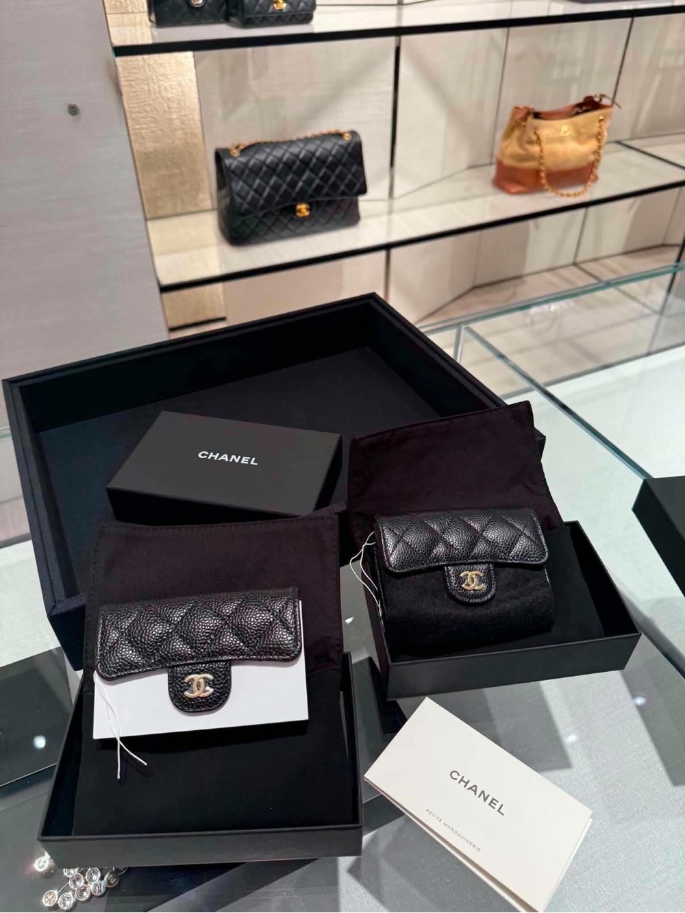 CHANEL Black Quilted Leather Small Wallet with Gold CC Logo